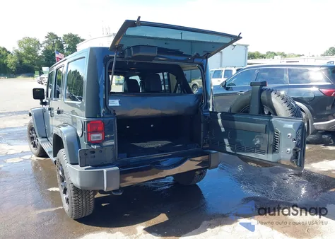 2017 Jeep Wrangler Unlimited Smoky Mountain 4X4 из США, поврежденный, VIN 1C4HJWEG2HL633800